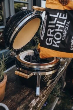 Monolith ICON Black Keramikgrill Tischgrill Inkl. Gestell -Broil King Verkäufe Monolith Icon Holzkohle befuellen